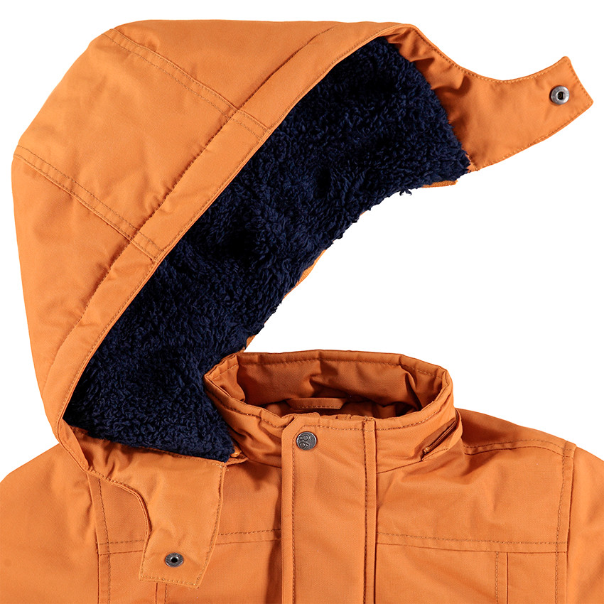 Parka en coton enduit doublée sherpa avec poches à rabat 