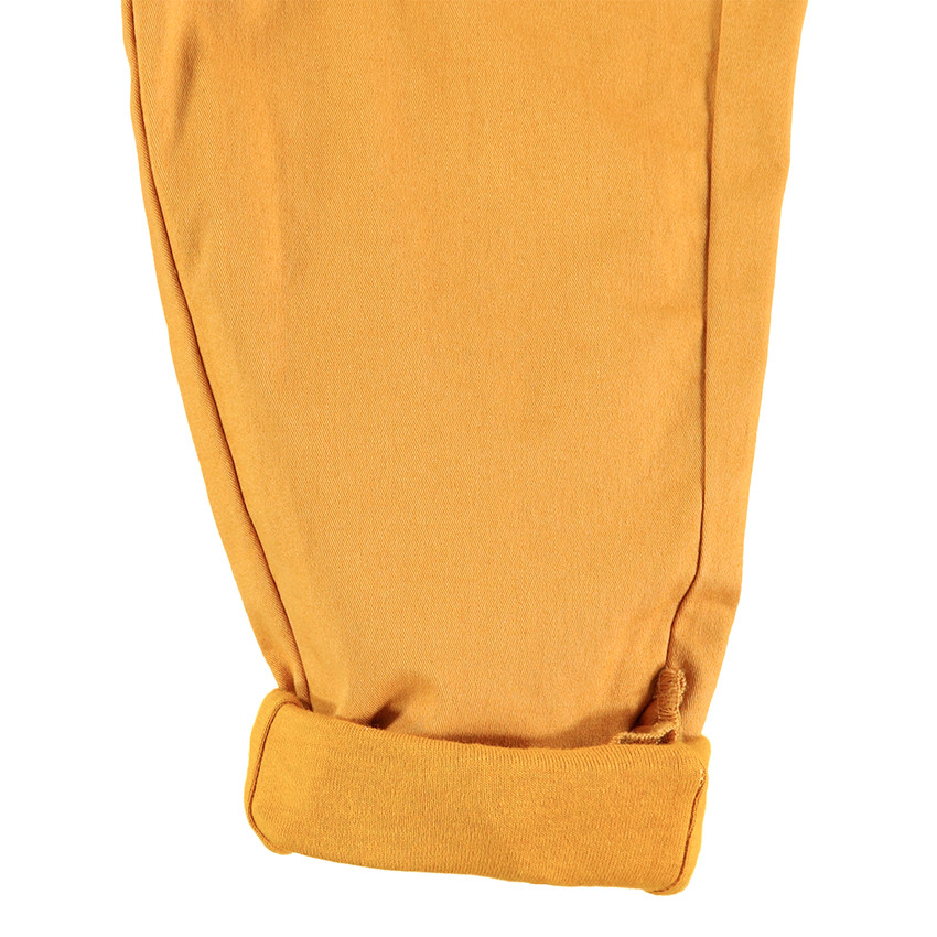 Pantalon en coton uni avec doublure en jersey et finition volantée 