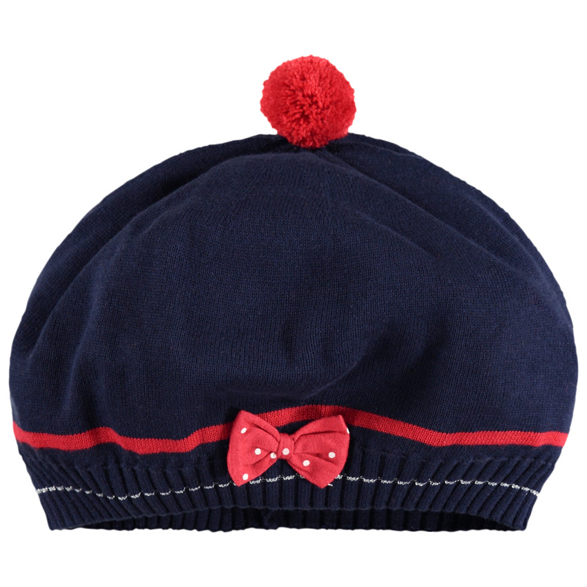 Béret en tricot avec noeud et pompon 