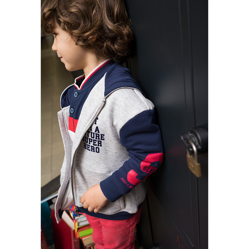 Polo manches longues en coton piqué avec bandes contrastées et poche 