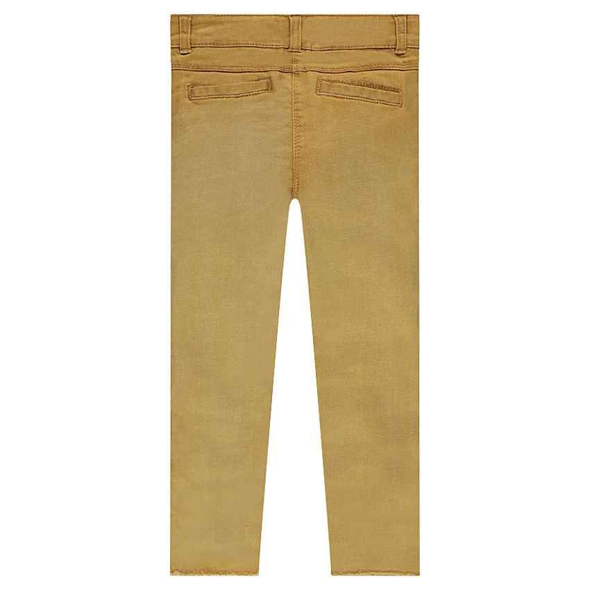 Jeans effet used avec oiseau et fleurs brodés sur les jambes  