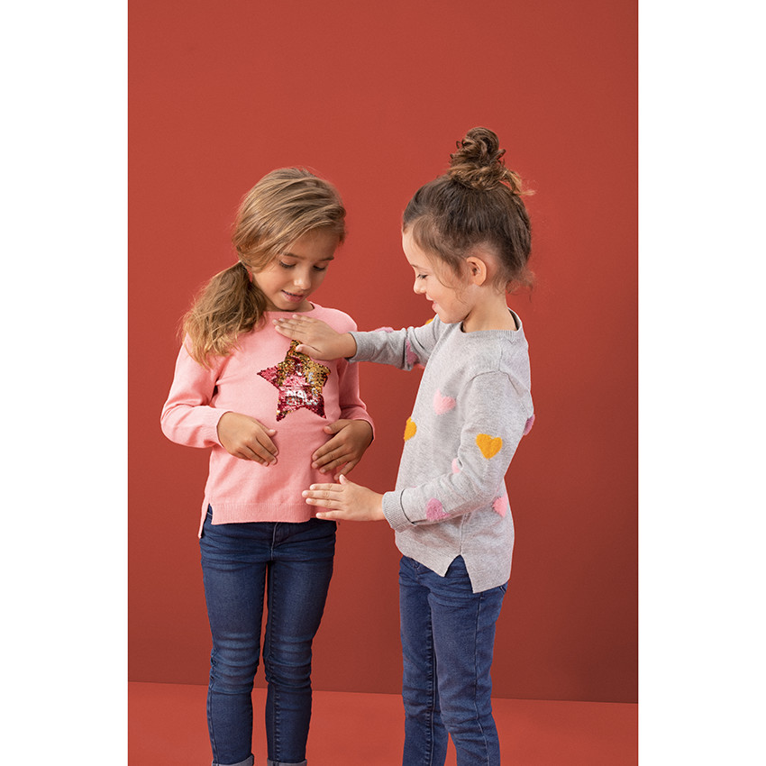 Pull en tricot uni avec motif fantaisie 