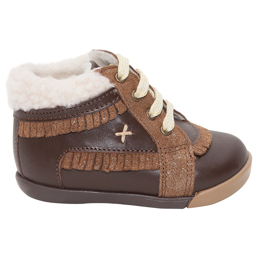 Bottillons en cuir fourrés avec franges pailletées  