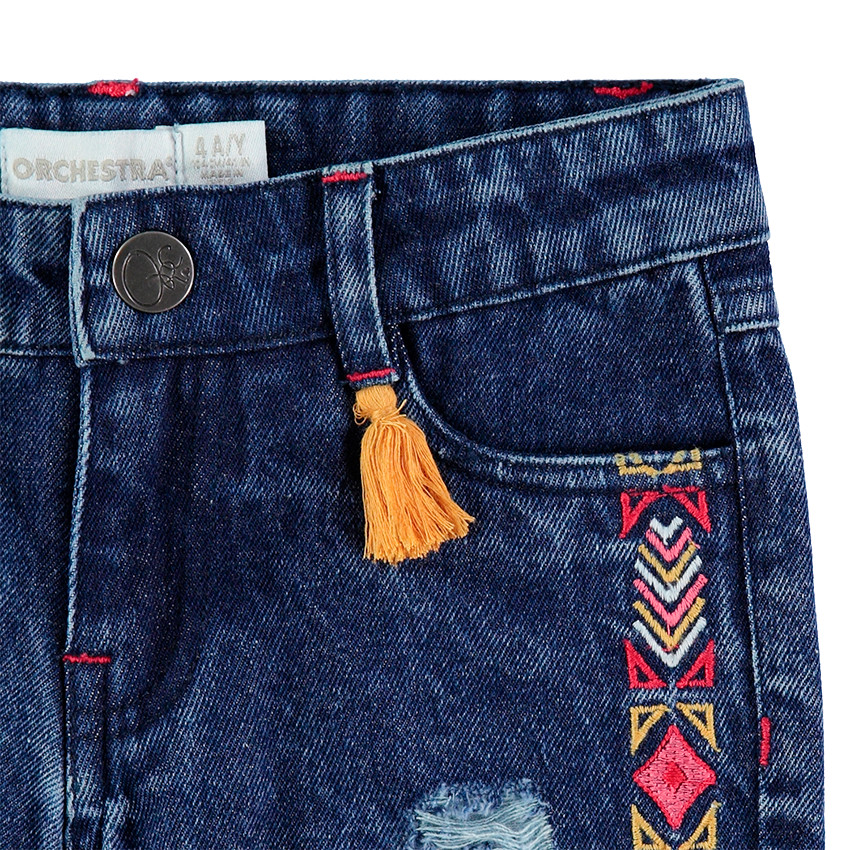 Short effet used avec frises brodées style ethnique et finition frangée 