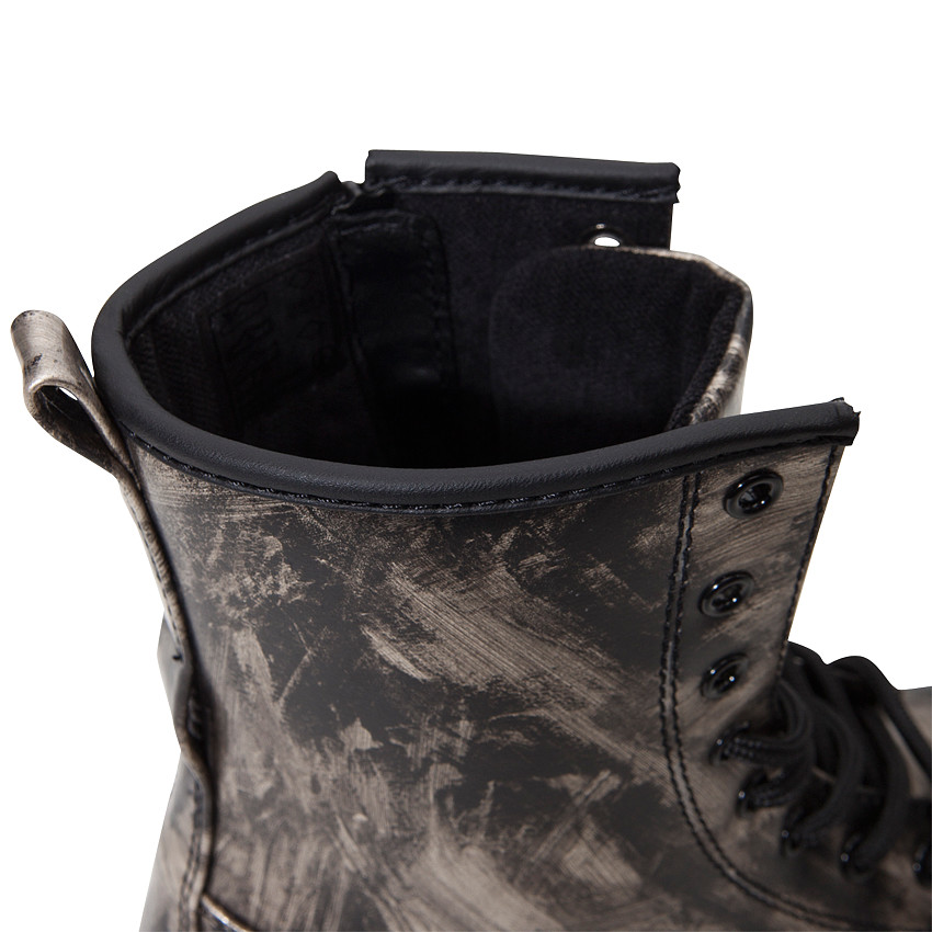 Bottillons montants noirs et dorés à lacets et zip 