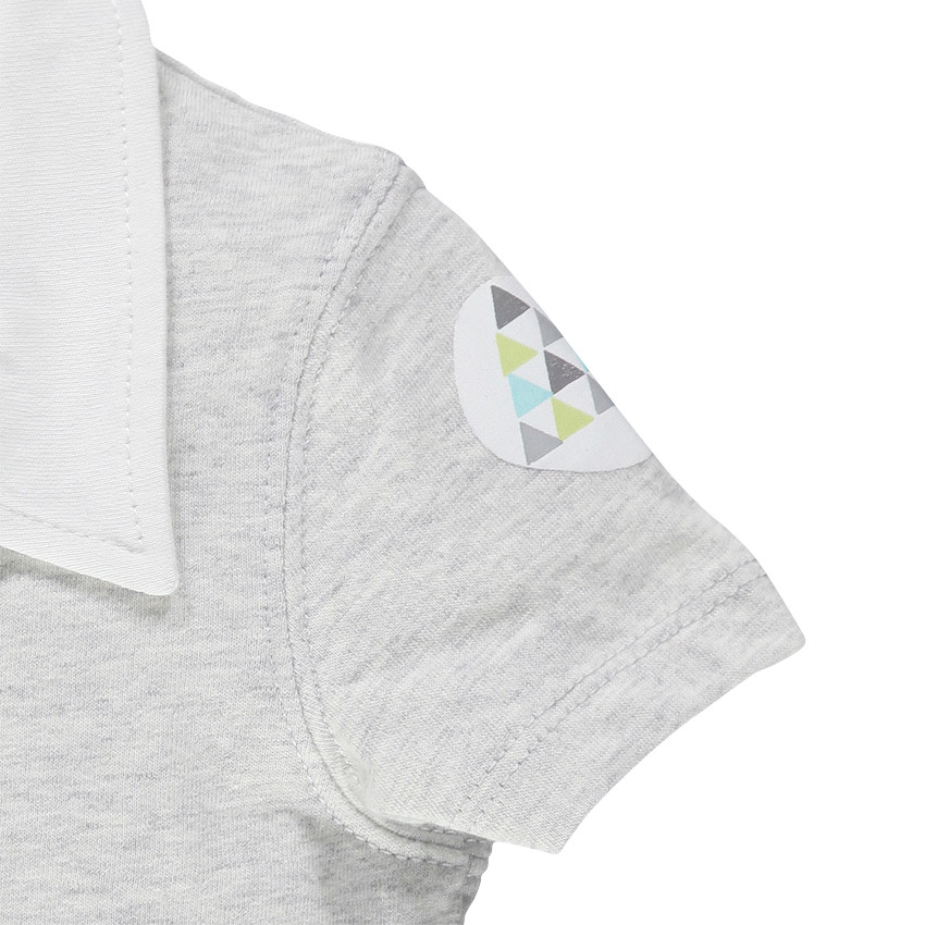 Polo manches courtes avec ouverture pressionnée devant 