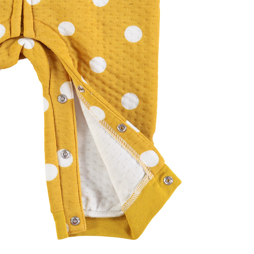 Combinaison longue à pois et détails brodés 