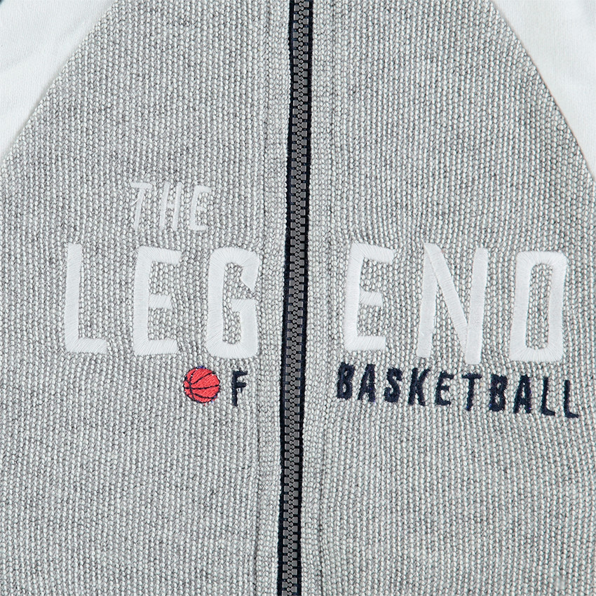 Jogging en molleton avec inscription brodée et poches zippées 