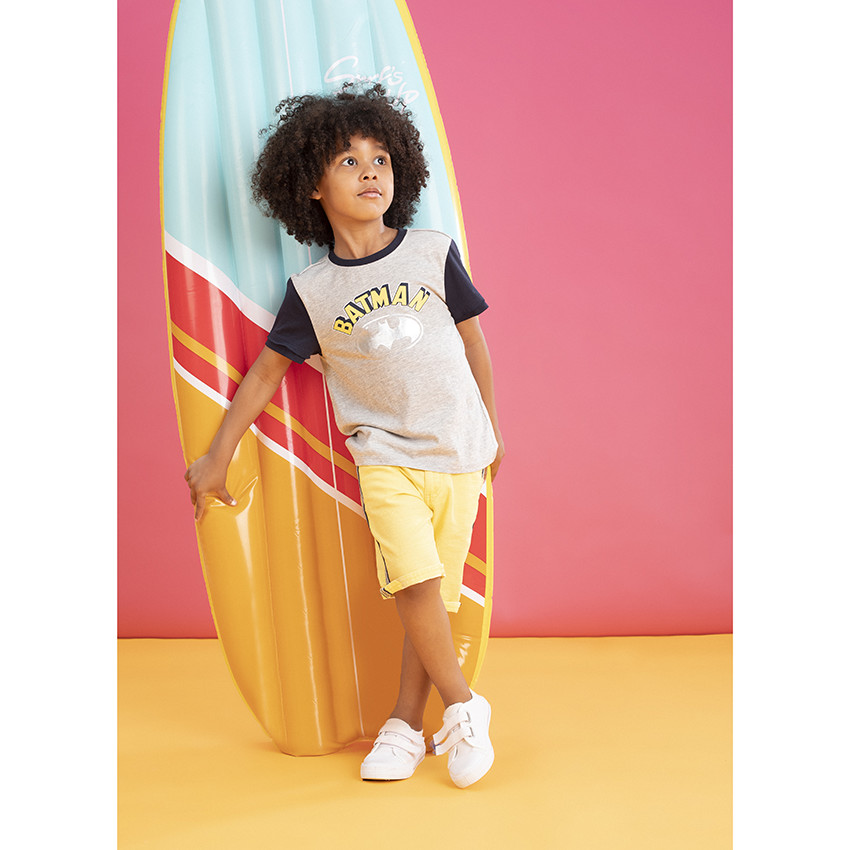 Bermuda en maille jaune à bandes appliquées 