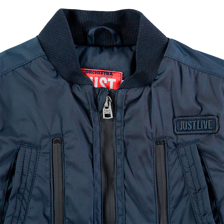 Junior - Teddy bleu uni avec doublure imprimée et poche zippée 