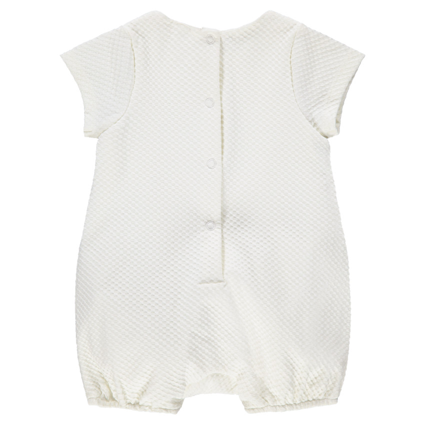 Combinaison courte en maille fantaisie avec noeud cousus sur le devant 