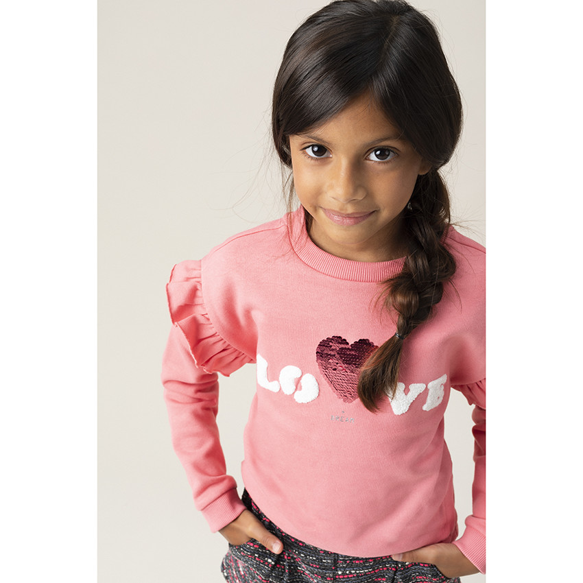 Sweat en molleton à volants et coeur en sequins magiques 