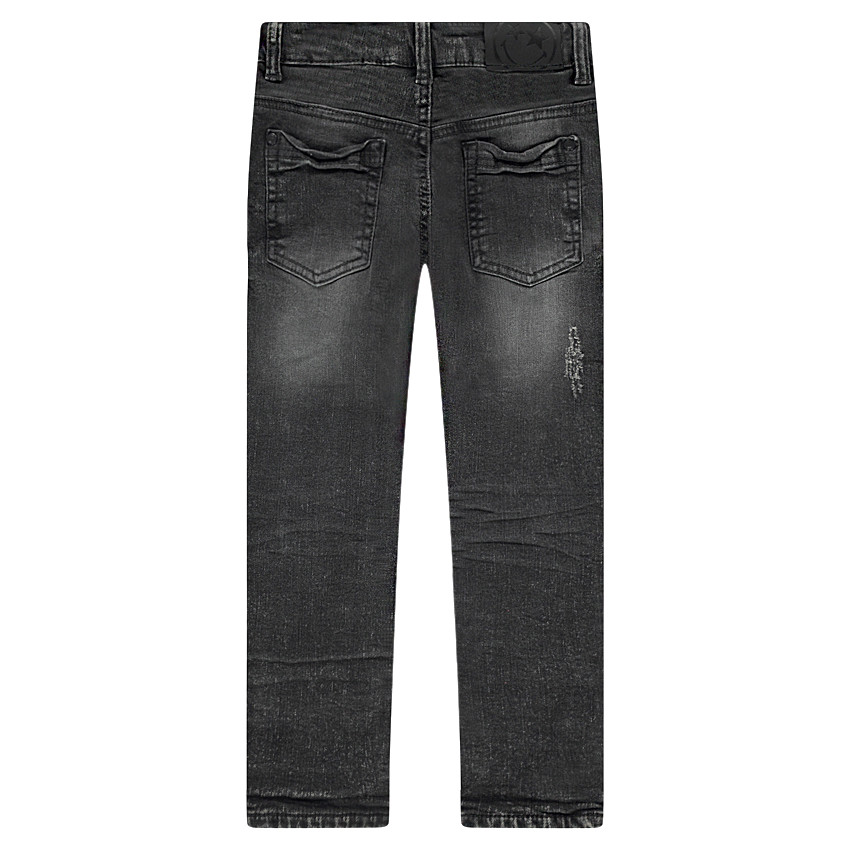 Jeans effet used doublé jersey avec badges brodés 