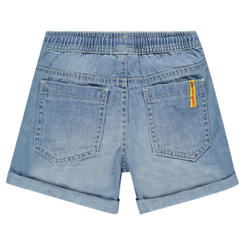 Bermuda en jeans effet used avec badges patchés Warner Superman 