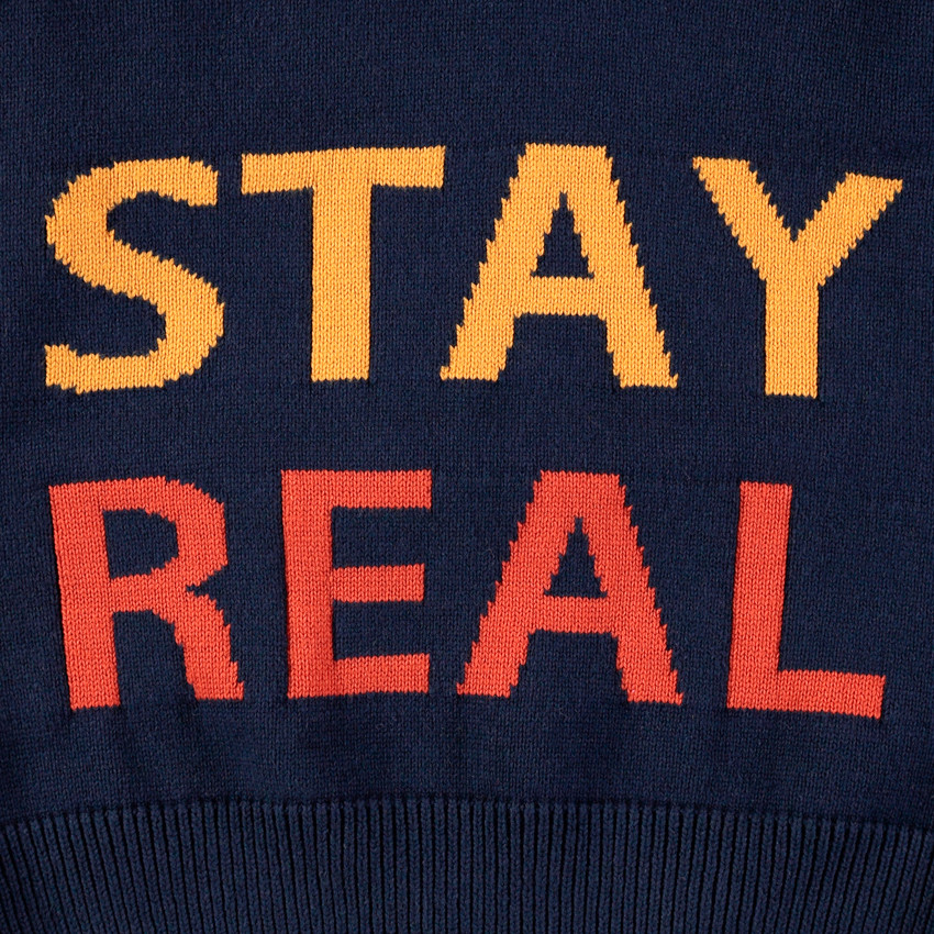 Junior - Pull en tricot avec inscriptions en jacquard et col zippé 