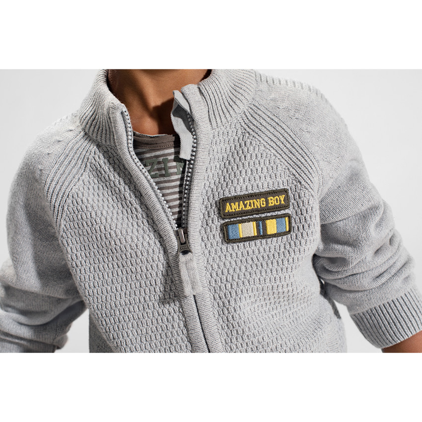 Gilet en tricot zippé avec badge patché sur la poitrine 