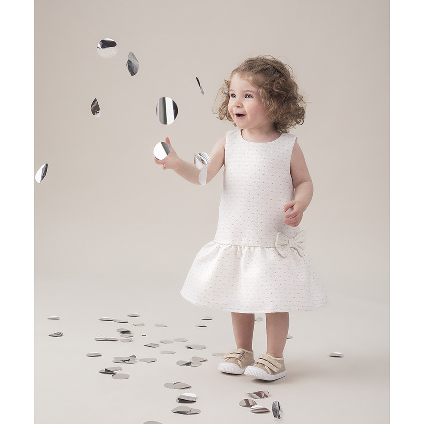 Robe sans manches à pois dorés et noeud 