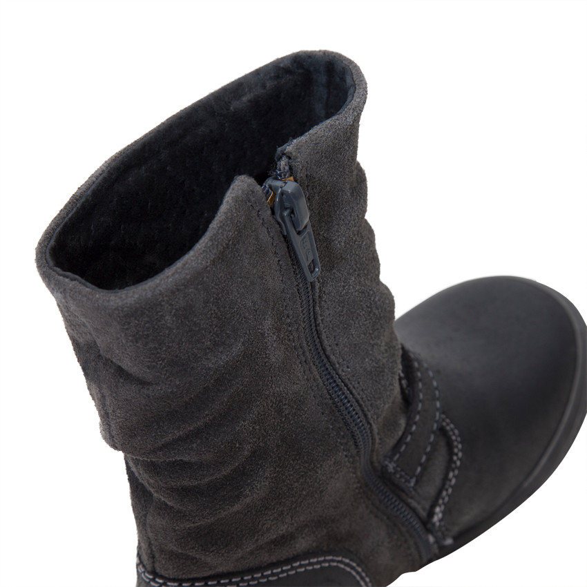 Bottines en cuir avec tige fluide et étoile en sequins 