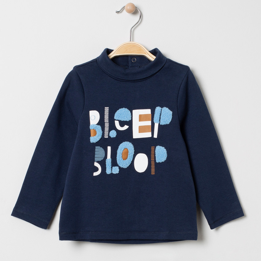 Sous-pull col roulé à inscription en bouclette  