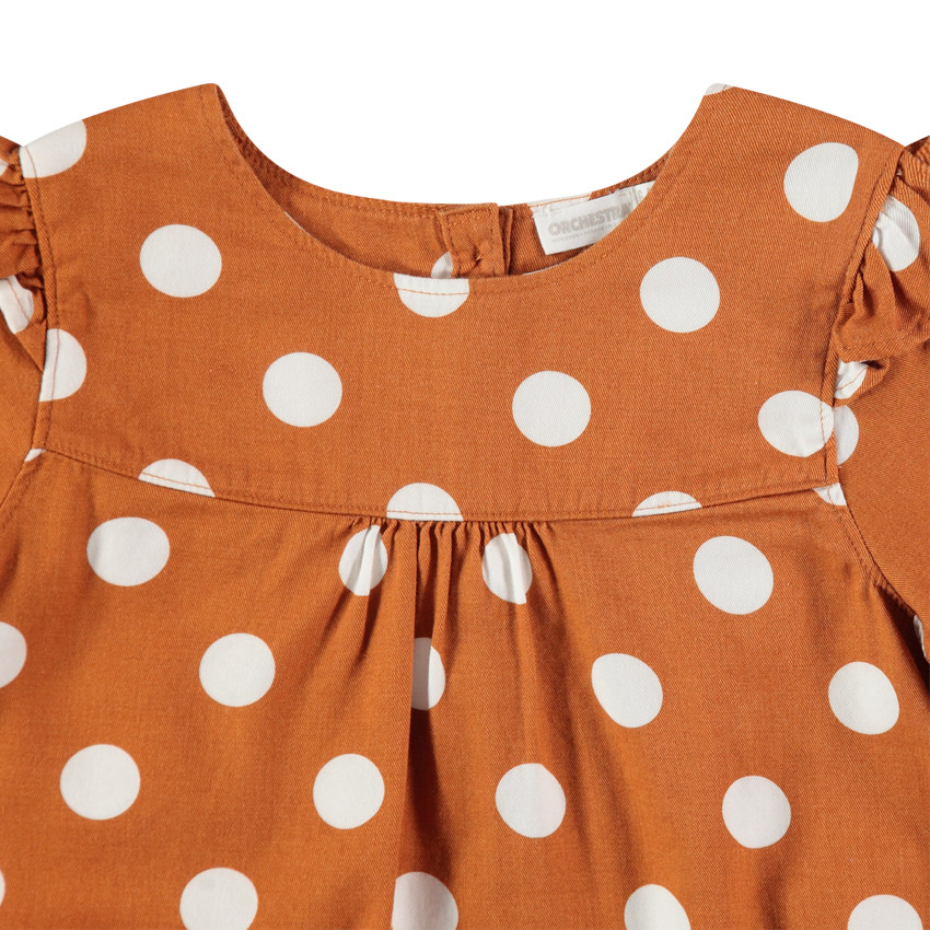 Tunique manches longues à pois blancs et volants 