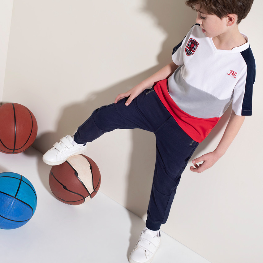 Jogging en molleton avec inscription brodée et poches zippées 