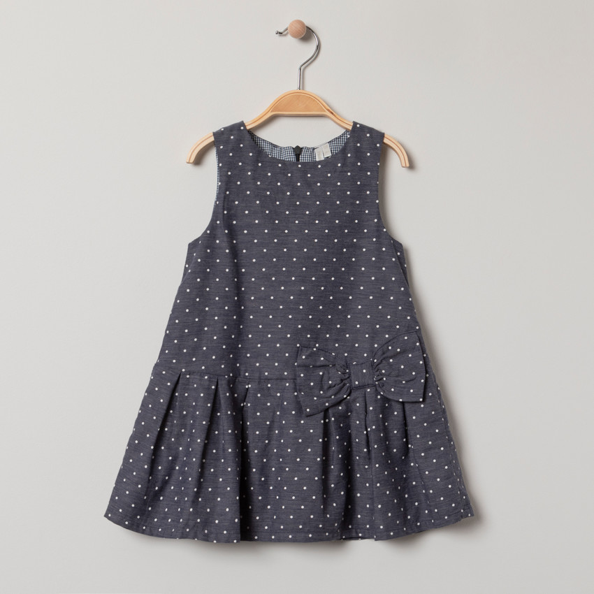 Robe sans manches à pois all-over et noeud  
