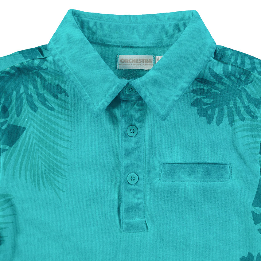 Polo manches courtes en coton surteint à imprimé tropical all-over 