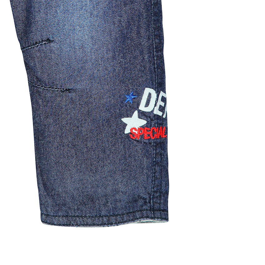 Jeans effet used doublé jersey avec print fantaisie 