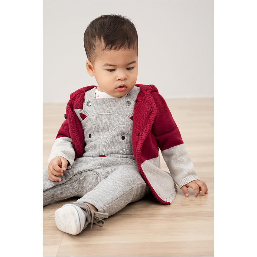 Gilet en tricot bicolore avec double boutonnage 