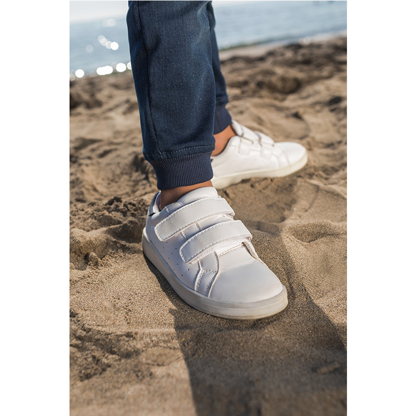 Jeans en molleton effet denim used avec badges 