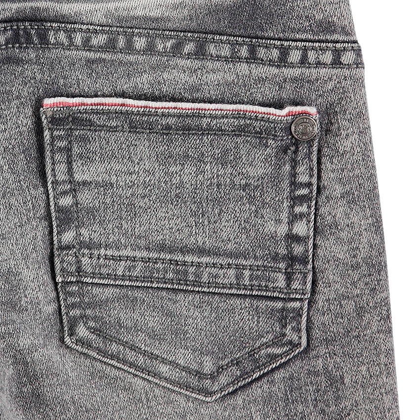 Jeans coupe skinny effet used et crinkle 