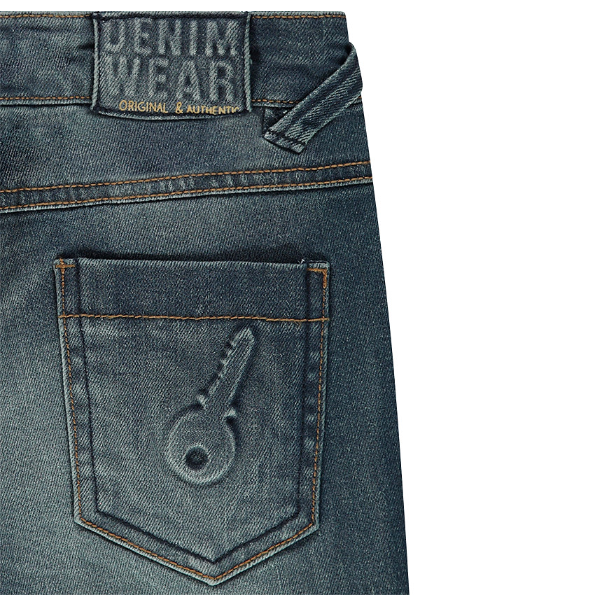 Jeans effet used et crinkle avec ombres et déchirures 