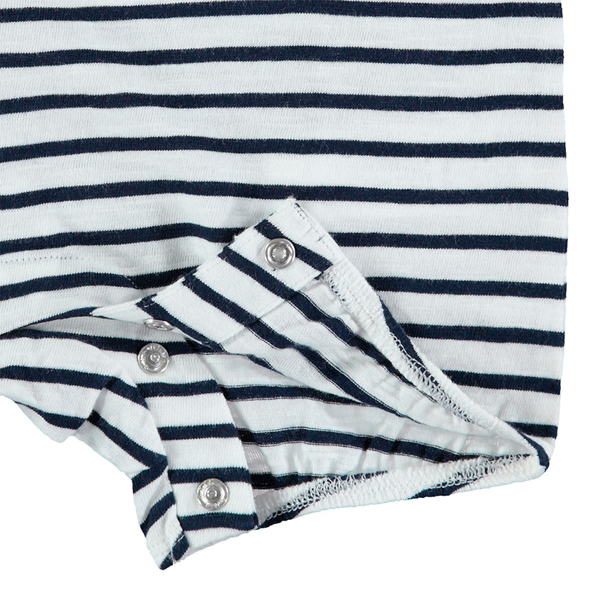 Combinaison courtes avec volant au col et noeud rouge 