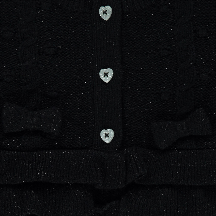 Gilet en tricot avec volants et boutons forme coeur 