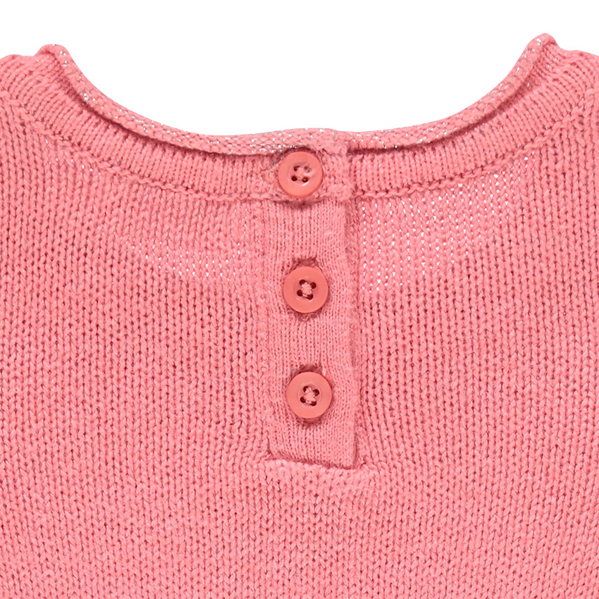 Pull en tricot uni avec message en sequins 