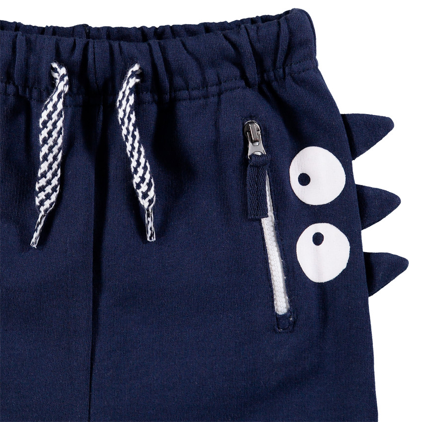 Pantalon de jogging en molleton avec poche zippée et monstre printé 