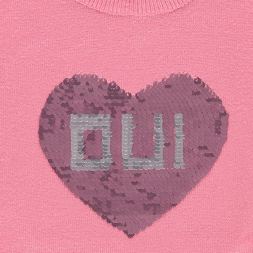 Pull en tricot avec fantaisies sur le devant 