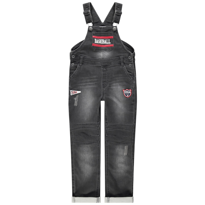 Salopette en jean effet used et crinkle avec prints et badges 