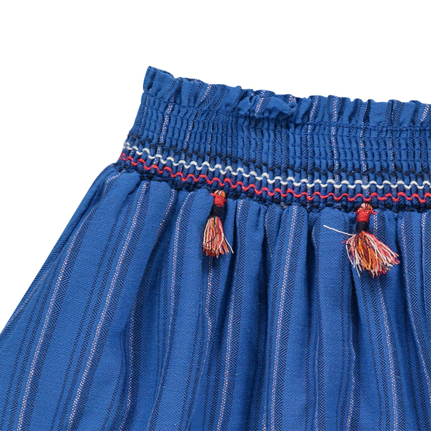 Jupe patineuse rayée avec pompons et broderies 