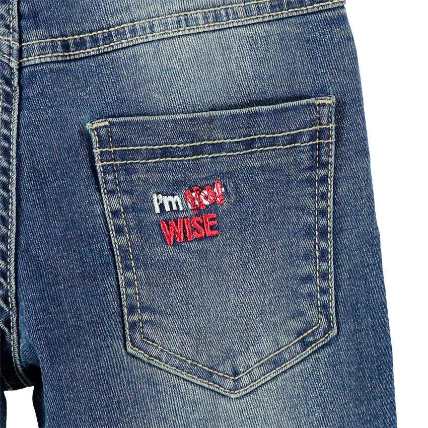 Jeans effet used avec bretelles élastiquées amovibles 