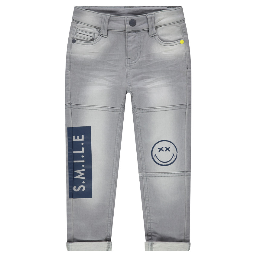 Jeans en molleton effet used avec prints Smiley 