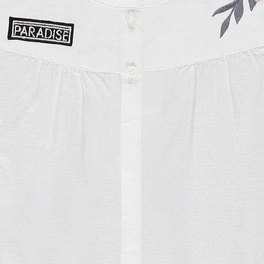 Chemisier manches courtes en coton avec fleur brodée et volants 