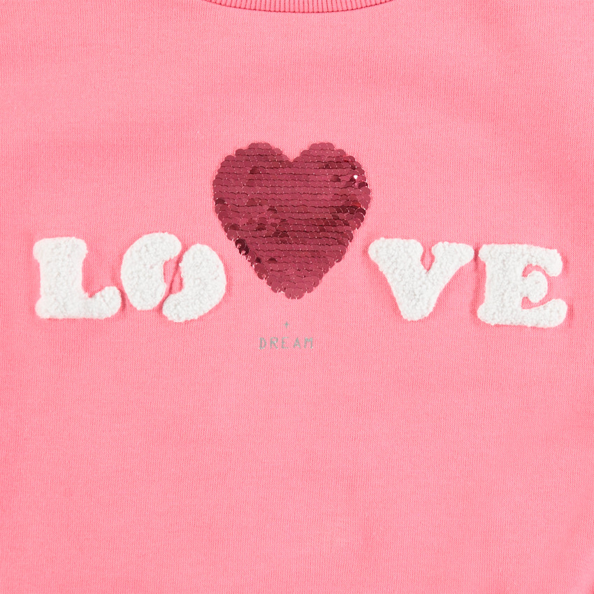 Sweat en molleton à volants et coeur en sequins magiques 