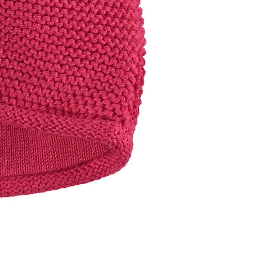Bonnet en tricot uni avec pompon 