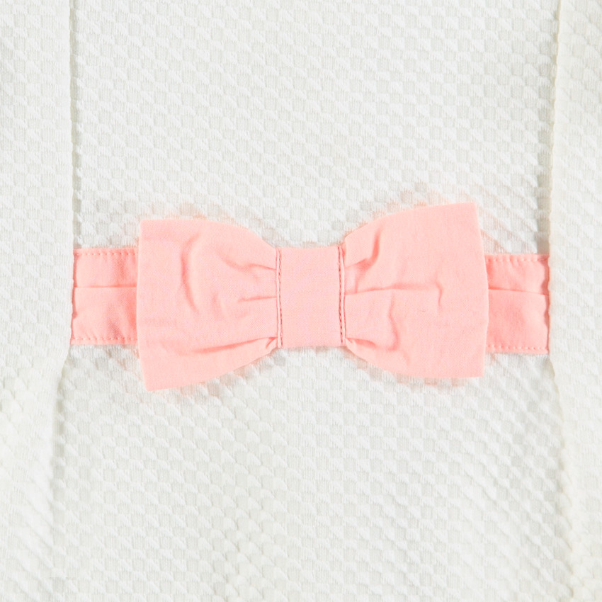 Combinaison courte en maille fantaisie avec noeud cousus sur le devant 