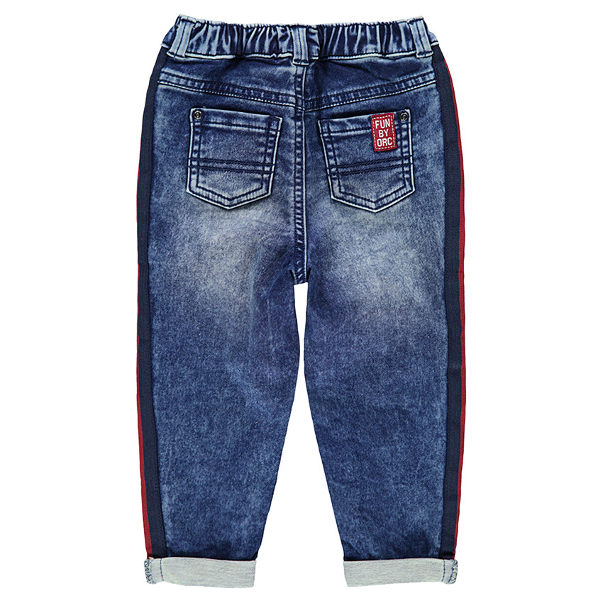 Jeans effet used élastiqué avec bandes contrastées sur les cotés 