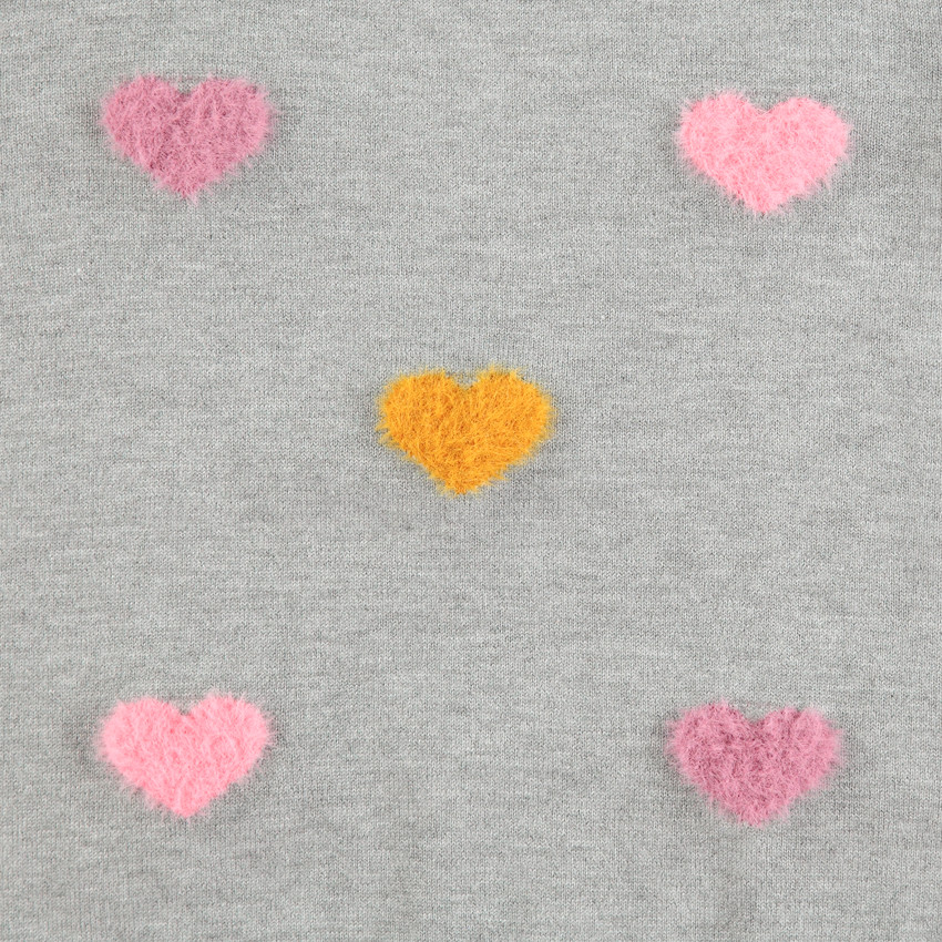 Pull en tricot uni avec motif fantaisie 