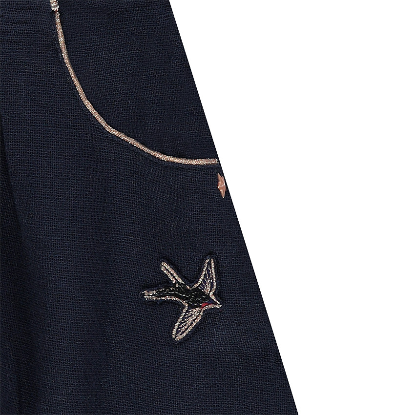 Jupe à bretelles volantées et badge patché forme oiseau 