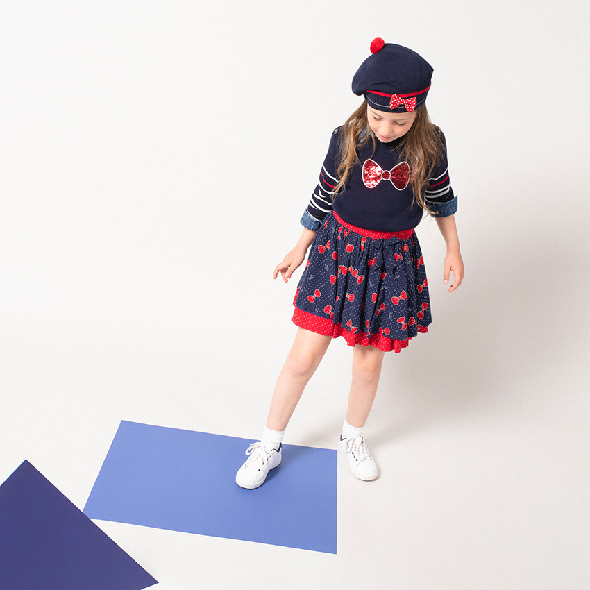 Jupe volantée à noeuds et pois all-over 