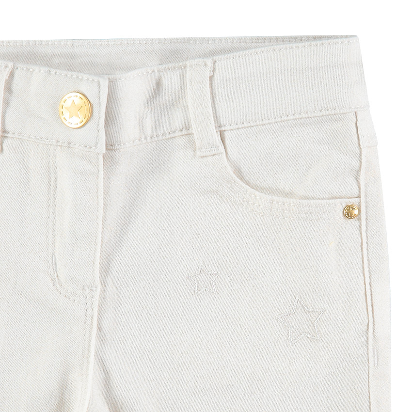 Pantalon en twill avec enduction pailletée et étoiles brodées 